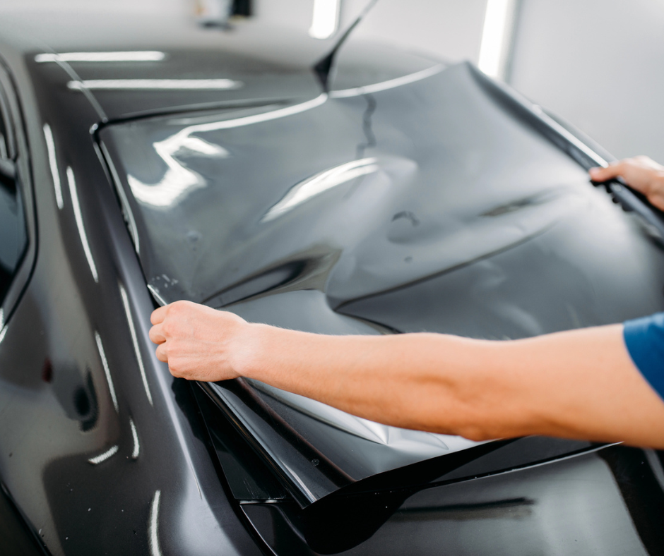 Matrix premium tinting being applied to car back windscreen.