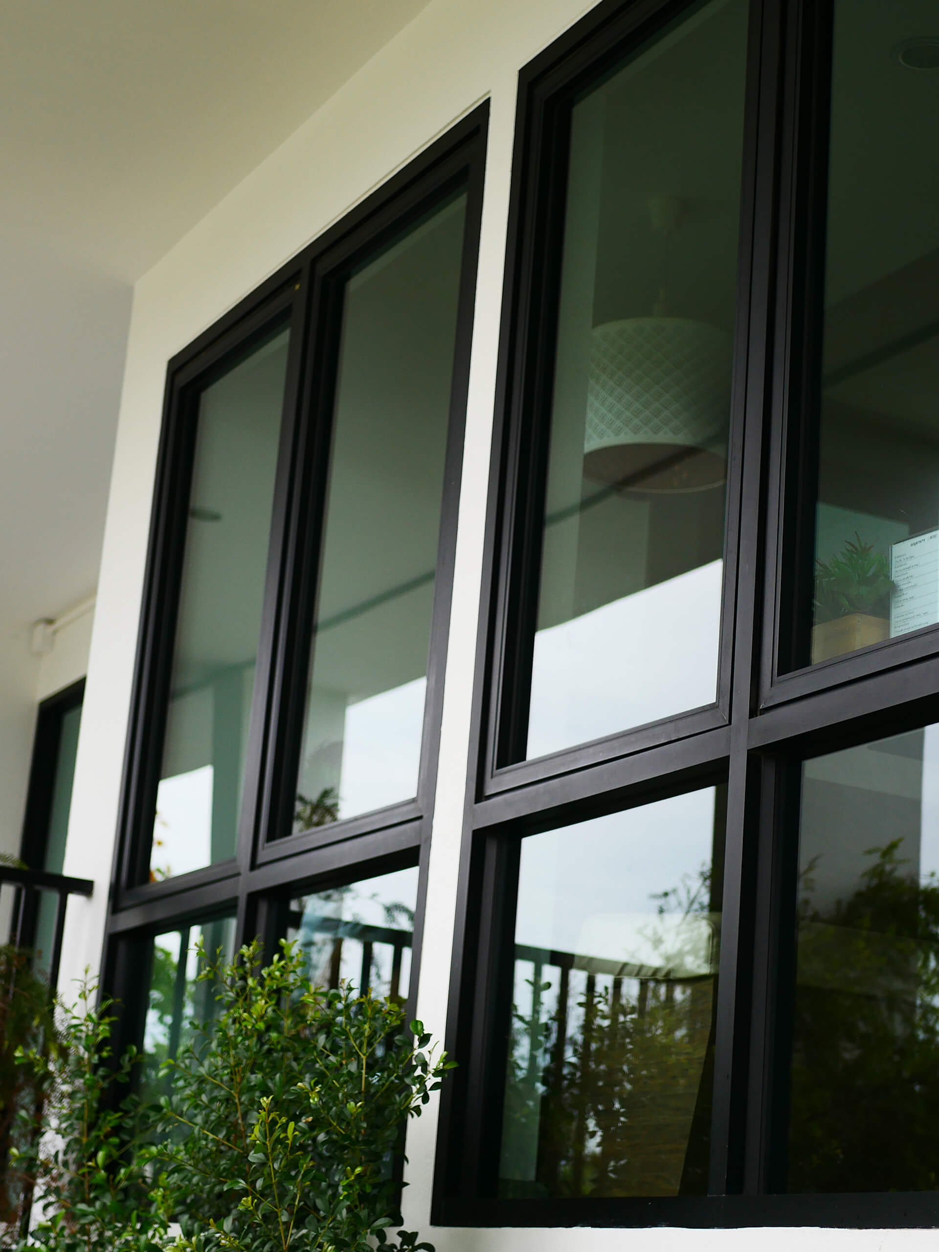 Close-up of a glass door with one way privacy window film