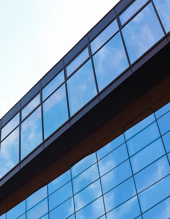 Daylight view of a building using privacy window film for added discretion