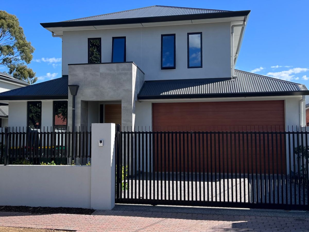 Exterior view of a house with one way privacy window film on front windows