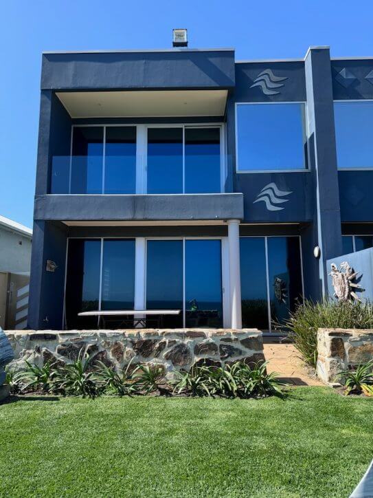 Privacy window tinting for a coastal home